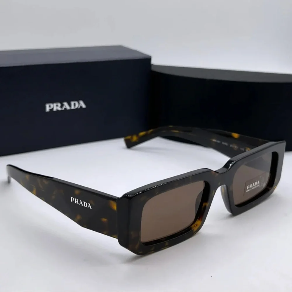 Prada PR06YS Brown Sunglasses with Bold Frames and UV Protection